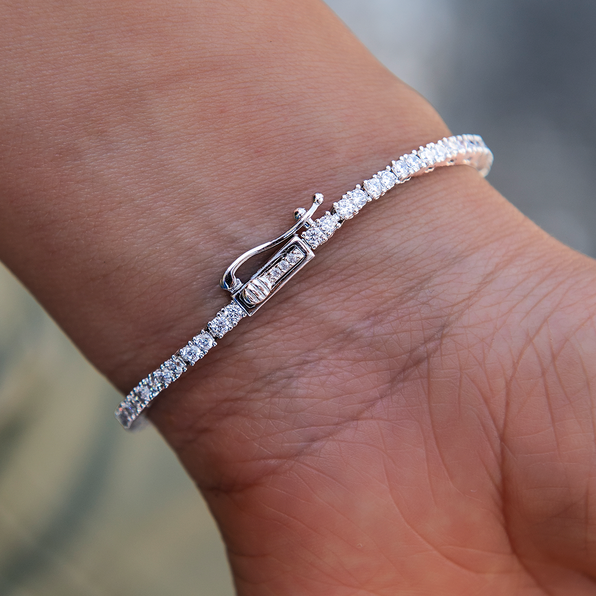 Colored Iced Rock Diamond Tennis Bracelet in White Gold
