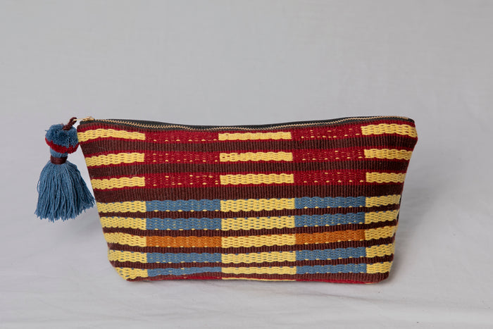 Flatlay of Weekender Cosmetic Pouch in Cabernet